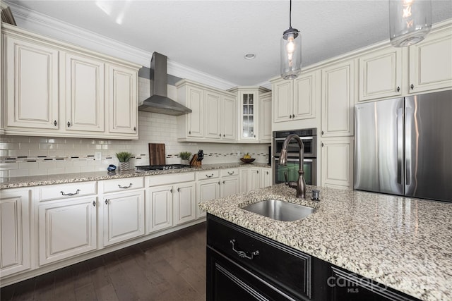 12942 Blakemore Ave, Huntersville, NC 28078 - kitchen with stainless steel appliances, wall chimney range hood, a sink, pendant lighting, and decorative backsplash