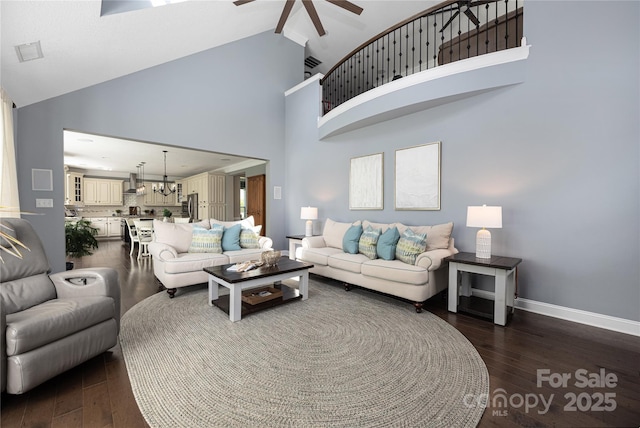 12942 Blakemore Ave, Huntersville, NC 28078 - living area with a ceiling fan, baseboards, high vaulted ceiling, and dark wood finished floors