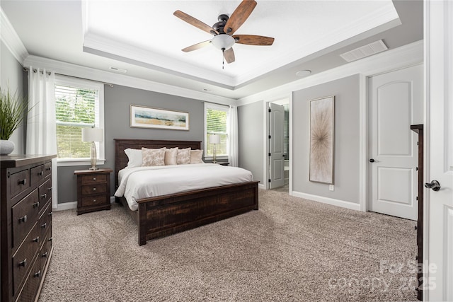 12942 Blakemore Ave, Huntersville, NC 28078 - bedroom featuring light colored carpet, crown molding, a tray ceiling, and visible vents