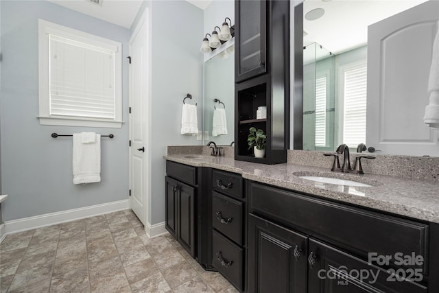 12942 Blakemore Ave, Huntersville, NC 28078 - full bath featuring baseboards, a sink, and double vanity