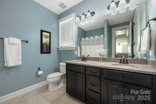12942 Blakemore Ave, Huntersville, NC 28078 - full bathroom featuring visible vents, toilet, tile patterned floors, and a sink