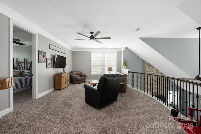 12942 Blakemore Ave, Huntersville, NC 28078 - living area featuring visible vents, a ceiling fan, carpet floors, crown molding, and baseboards