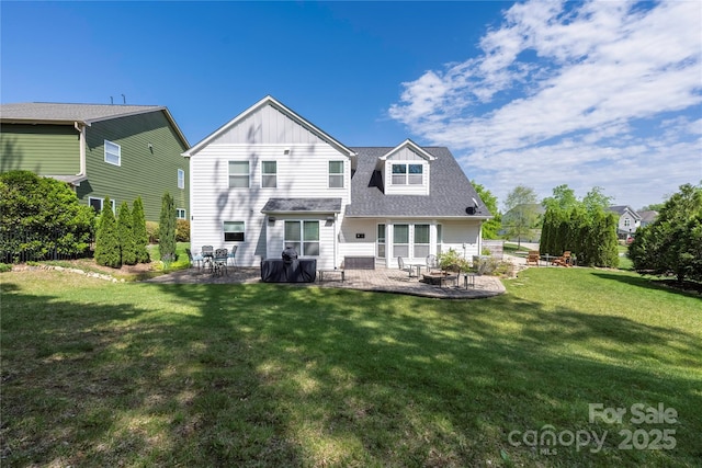 12942 Blakemore Ave, Huntersville, NC 28078 - rear view of house with a fire pit, a yard, a patio, and board and batten siding