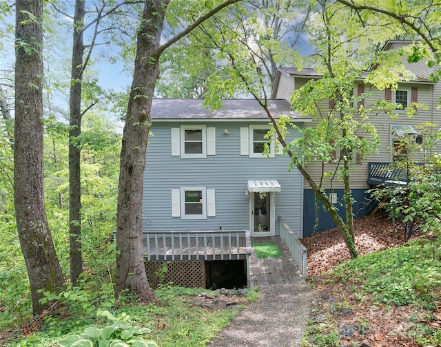 view of front of property featuring a wooden deck