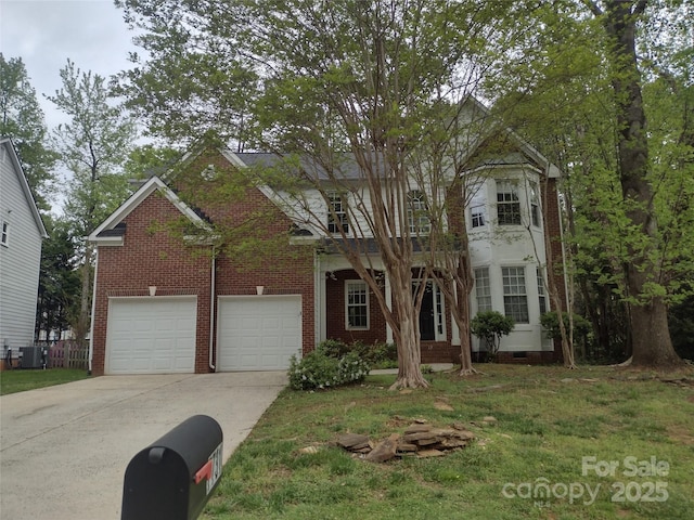 view of front facade featuring a front yard, an attached garage, cooling unit, concrete driveway, and brick siding
