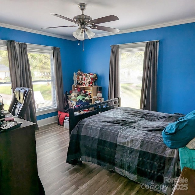 1306 Brantley Rd, Kannapolis, NC 28083 - bedroom featuring wood finished floors, crown molding, ceiling fan, and baseboards