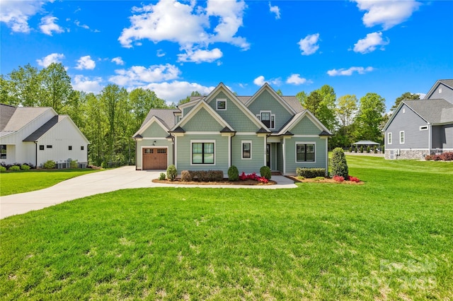 108 Castleview Ln, Mooresville, NC 28115 - craftsman house featuring an attached garage, a front lawn, and concrete driveway