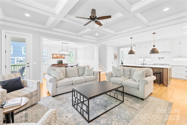 108 Castleview Ln, Mooresville, NC 28115 - living area featuring stairway, light wood-style floors, beamed ceiling, coffered ceiling, and recessed lighting