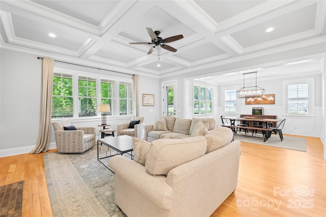 108 Castleview Ln, Mooresville, NC 28115 - living room featuring ceiling fan with notable chandelier, light wood finished floors, coffered ceiling, beam ceiling, and recessed lighting