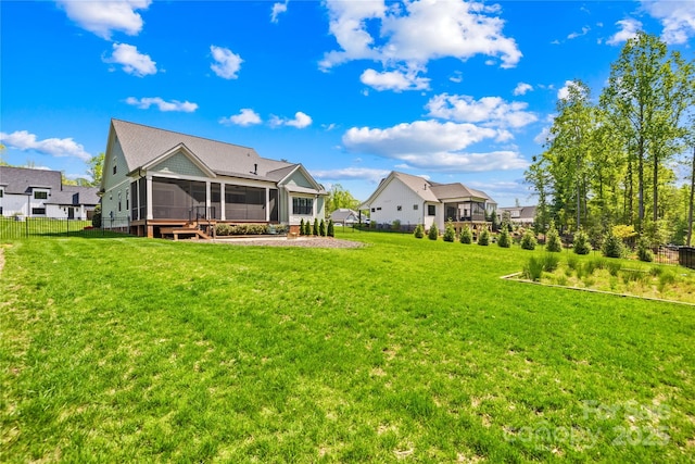 108 Castleview Ln, Mooresville, NC 28115 - rear view of house featuring fence, a lawn, and a sunroom