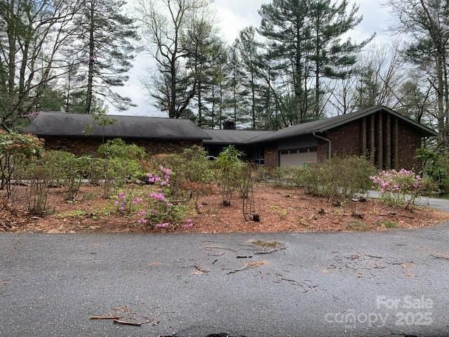 101 Lakemont Dr, Flat Rock, NC 28731 - view of side of home featuring a garage