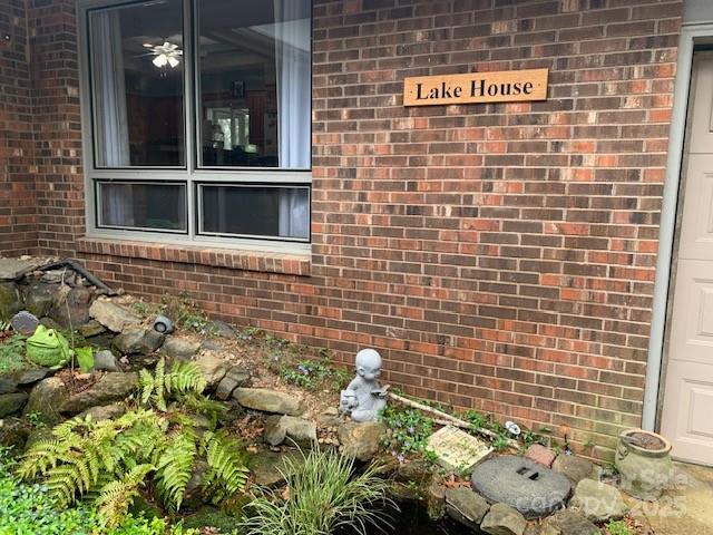 101 Lakemont Dr, Flat Rock, NC 28731 - view of property exterior featuring brick siding