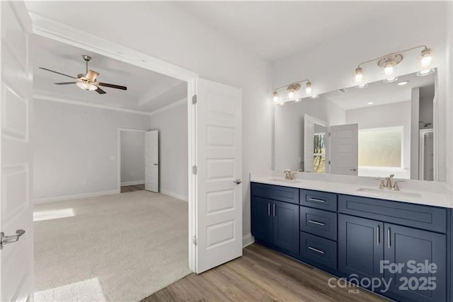 1469 Mocksville Hwy Unit 21, Statesville, NC 28625 - full bath featuring a ceiling fan, double vanity, baseboards, and wood finished floors