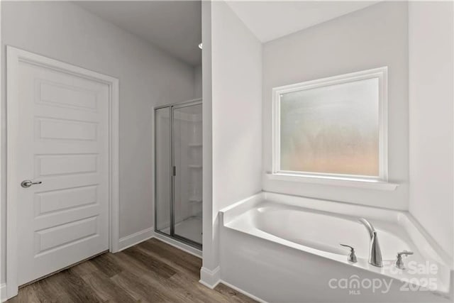 1469 Mocksville Hwy Unit 21, Statesville, NC 28625 - bathroom with a shower stall, a garden tub, wood finished floors, and baseboards