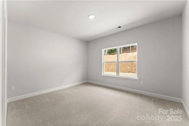 1469 Mocksville Hwy Unit 21, Statesville, NC 28625 - unfurnished room with light carpet, baseboards, and recessed lighting