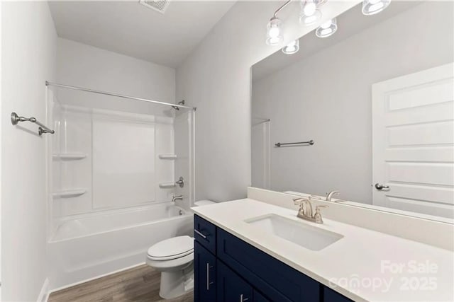1469 Mocksville Hwy Unit 21, Statesville, NC 28625 - full bathroom with toilet, wood finished floors, vanity, and shower / tub combination