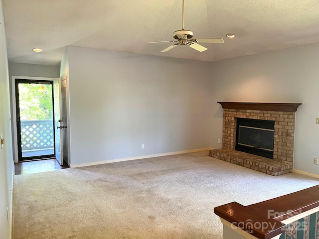 5810 Harris Grove Ln, Charlotte, NC 28212 - unfurnished living room with ceiling fan, carpet floors, a fireplace, and baseboards