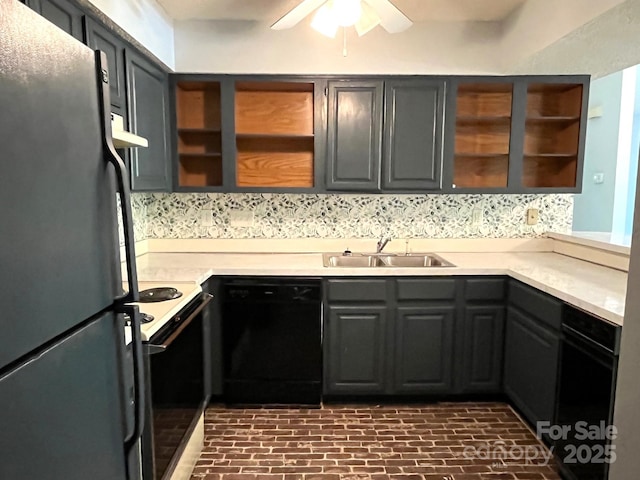 5810 Harris Grove Ln, Charlotte, NC 28212 - kitchen with a sink, glass insert cabinets, light countertops, brick patterned floor, and black appliances