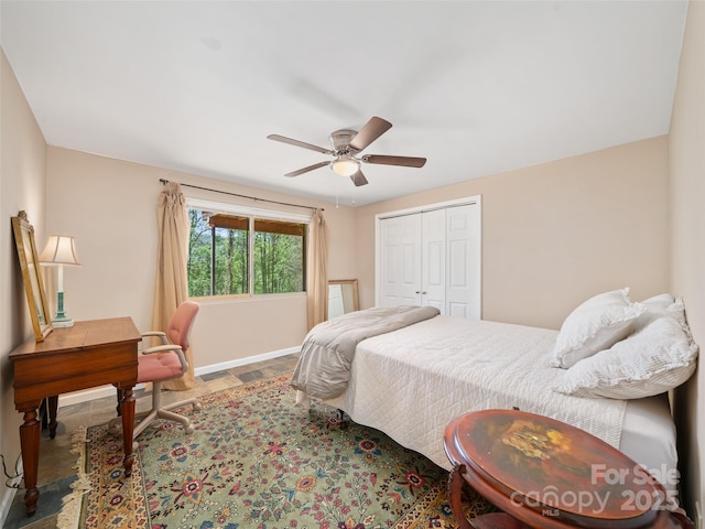 19 Old Patton Hill Rd, Swannanoa, NC 28778 - bedroom featuring baseboards, a closet, and a ceiling fan