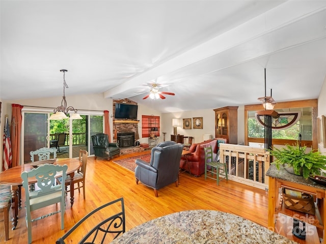 19 Old Patton Hill Rd, Swannanoa, NC 28778 - living area with plenty of natural light, a brick fireplace, a ceiling fan, and wood finished floors
