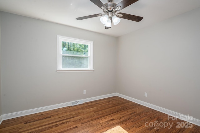 692 S Pink St, Cherryville, NC 28021 - empty room with baseboards, a ceiling fan, wood finished floors, and visible vents