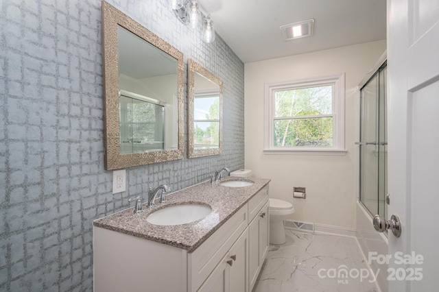 692 S Pink St, Cherryville, NC 28021 - bathroom with baseboards, marble finish floor, a sink, and toilet