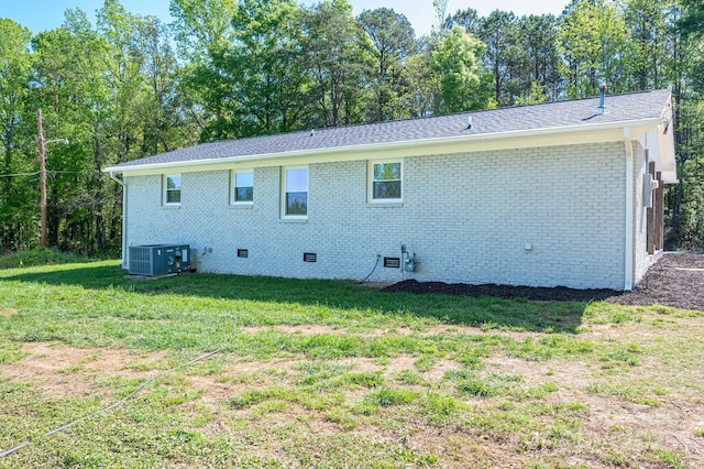 692 S Pink St, Cherryville, NC 28021 - back of house with cooling unit, a lawn, crawl space, and brick siding