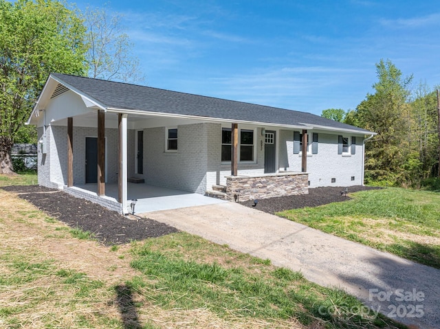 692 S Pink St, Cherryville, NC 28021 - single story home featuring concrete driveway, a front lawn, brick siding, and a carport