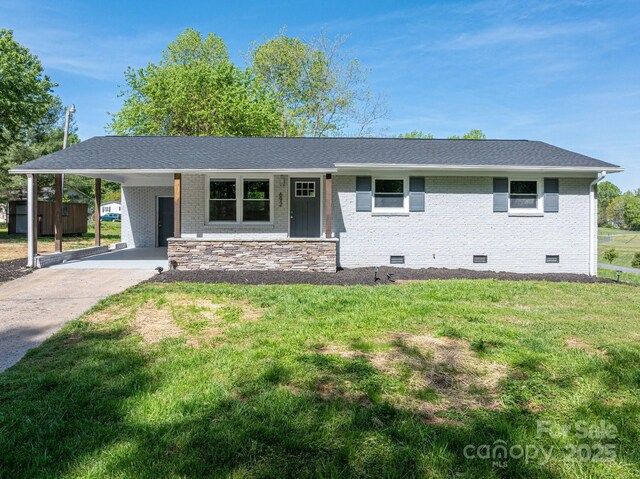 692 S Pink St, Cherryville, NC 28021 - ranch-style home with crawl space, concrete driveway, a front lawn, an attached carport, and roof with shingles