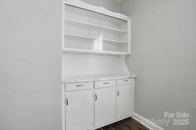 room details with wood finished floors and baseboards