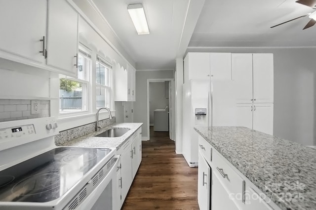 kitchen featuring crown molding, a sink, white appliances, ceiling fan, and dark wood-style floors