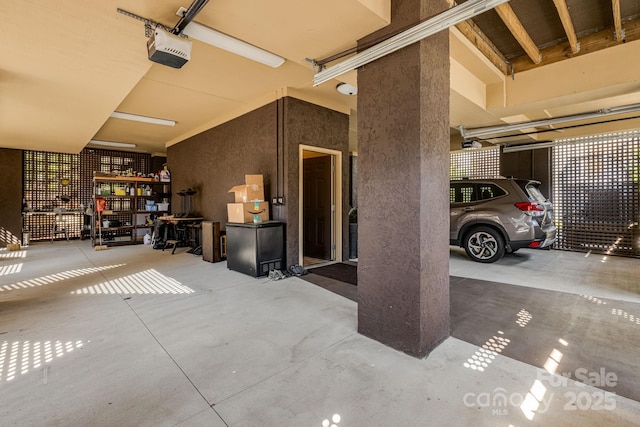 garage featuring a garage door opener