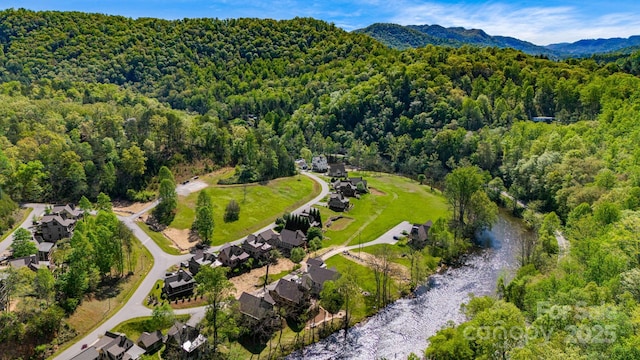 bird's eye view featuring a view of trees