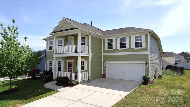 15747 Reynolds Dr, Indian Land, SC 29707 - view of front of house featuring a porch, an attached garage, a front lawn, and a balcony