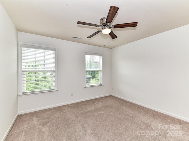 15747 Reynolds Dr, Indian Land, SC 29707 - spare room featuring carpet floors, visible vents, and baseboards