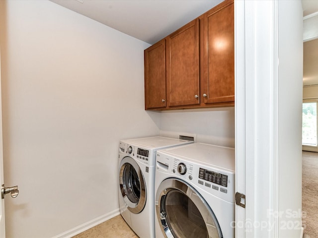 15747 Reynolds Dr, Indian Land, SC 29707 - clothes washing area with cabinet space, independent washer and dryer, and baseboards