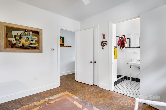 80 Sunset Dr, Marshall, NC 28753 - bedroom featuring ensuite bathroom, baseboards, and wood finished floors