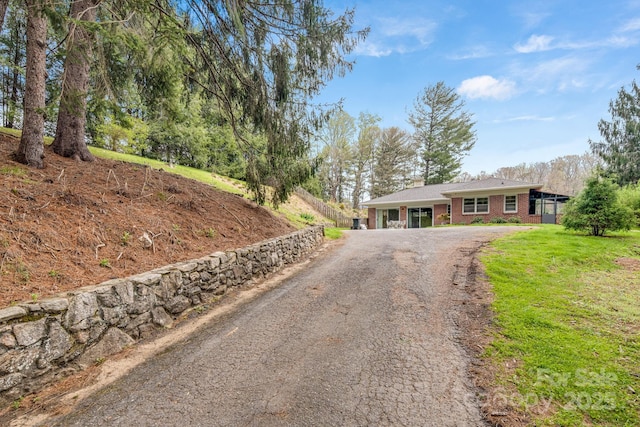 80 Sunset Dr, Marshall, NC 28753 - view of front of property with dirt driveway and brick siding