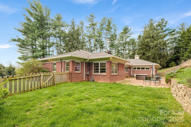 80 Sunset Dr, Marshall, NC 28753 - back of house featuring a fenced backyard, a patio area, brick siding, and a lawn