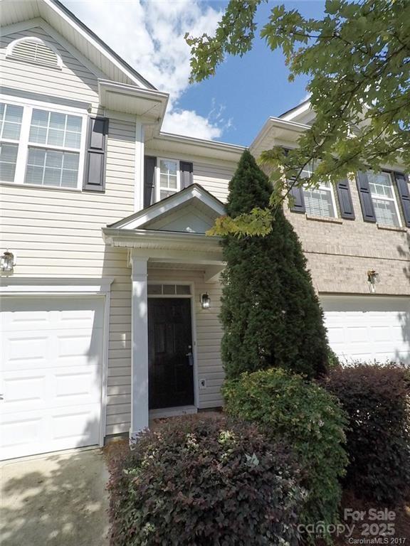 entrance to property with an attached garage