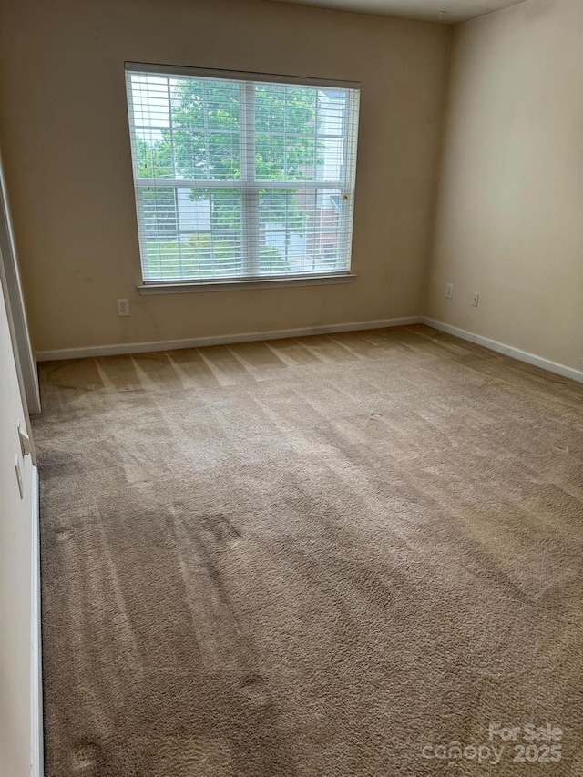 9668 Walkers Glen Dr NW, Concord, NC 28027 - carpeted spare room with baseboards