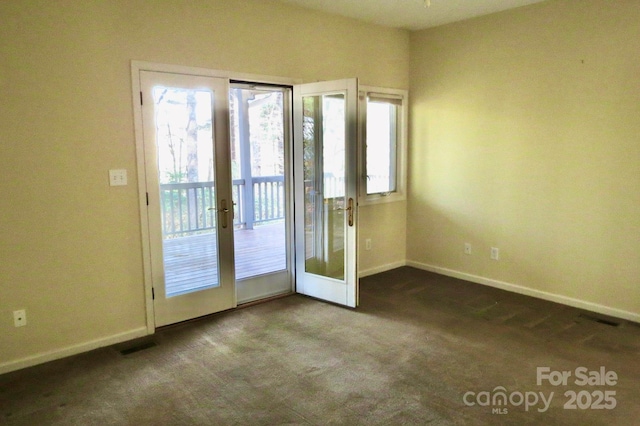 doorway with carpet flooring, french doors, baseboards, and visible vents