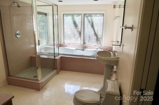 full bath with a bath and a shower stall