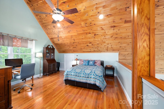 bedroom with wooden ceiling, baseboards, wood finished floors, and lofted ceiling