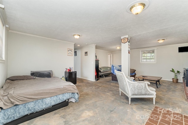 bedroom with baseboards, concrete flooring, and crown molding