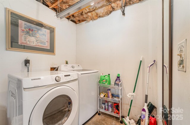 laundry area featuring independent washer and dryer and laundry area