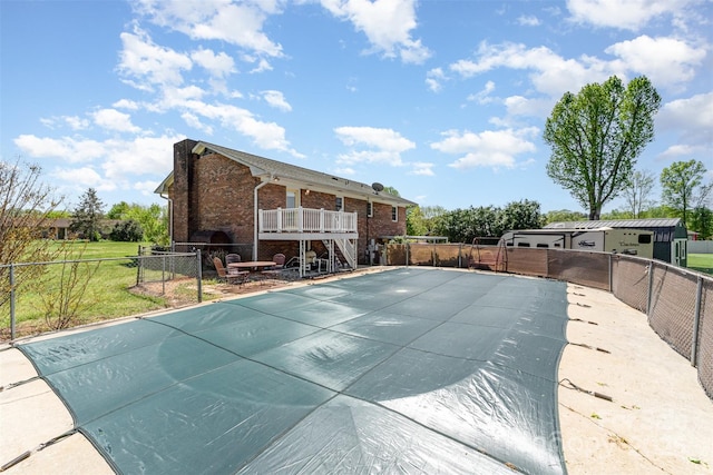 view of pool featuring a fenced backyard
