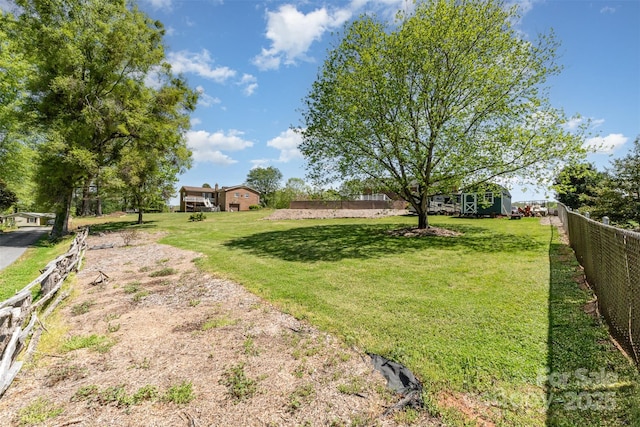 view of yard featuring fence