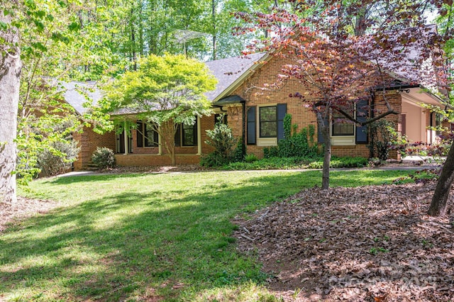 1058 General Hoke Dr, Lincolnton, NC 28092 - ranch-style house featuring brick siding and a front yard
