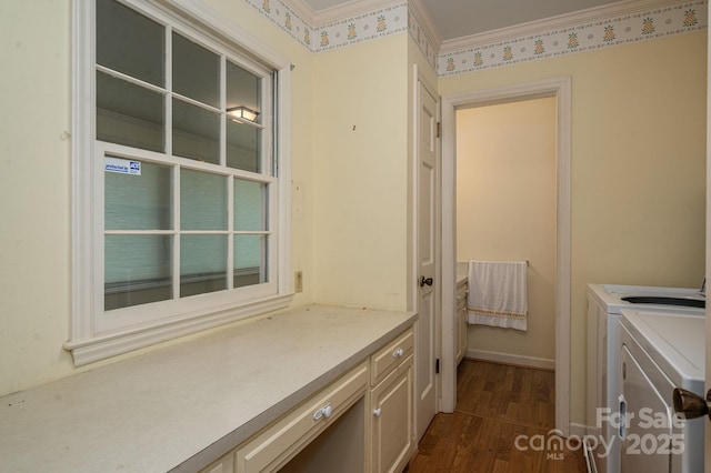 1058 General Hoke Dr, Lincolnton, NC 28092 - laundry room with dark wood-type flooring, cabinet space, ornamental molding, and washer and clothes dryer